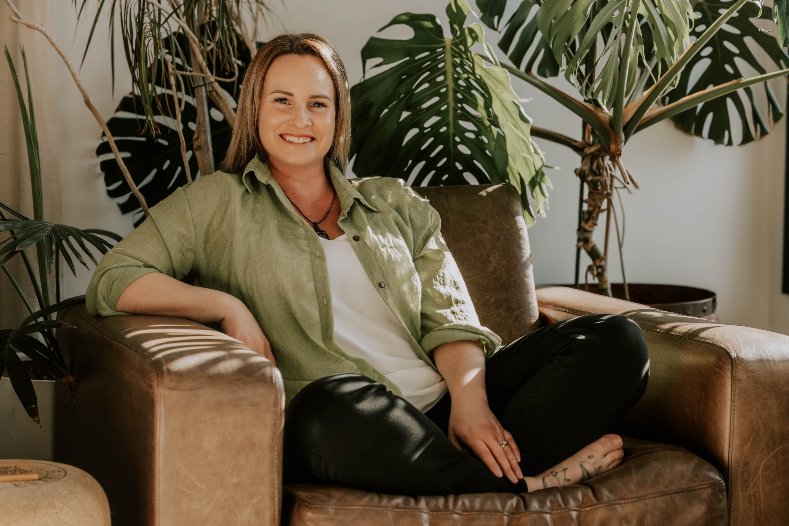 Joni Morrissey Sitting on Couch